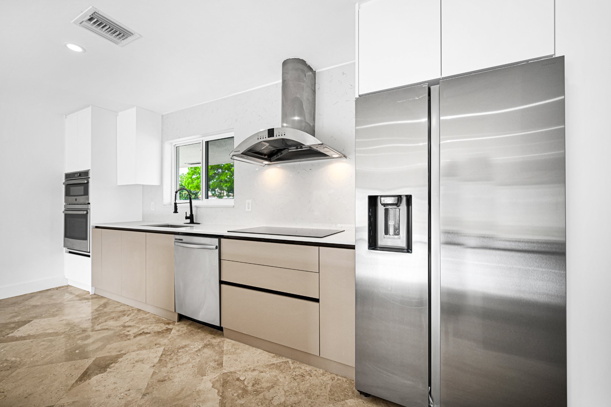 Kitchen with refrigerator